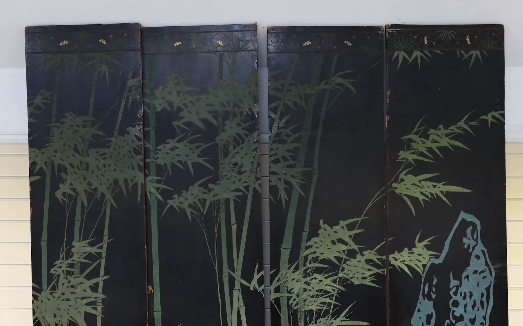 A tall Chinese coromandel lacquer twelve panel screen, 19th century, each leaf panel width 49cm, height 264cm